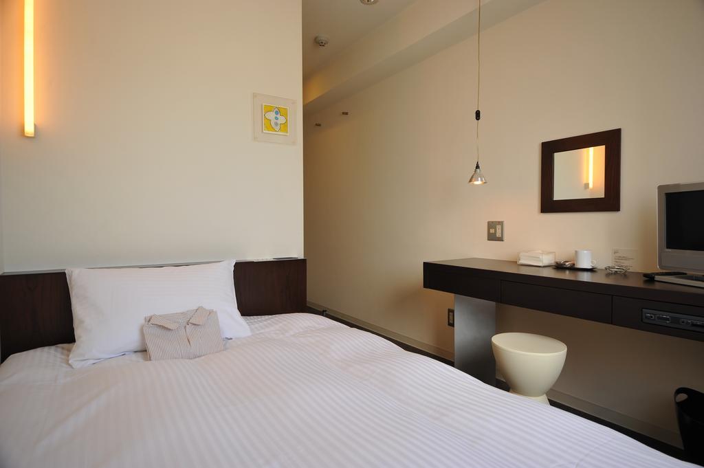 7 Days Hotel Plus Коті Номер фото
