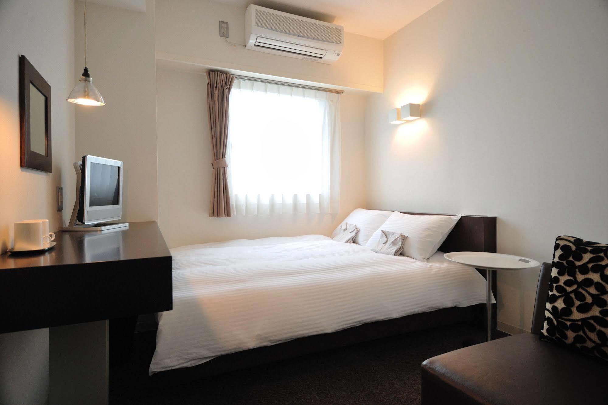 7 Days Hotel Plus Коті Екстер'єр фото