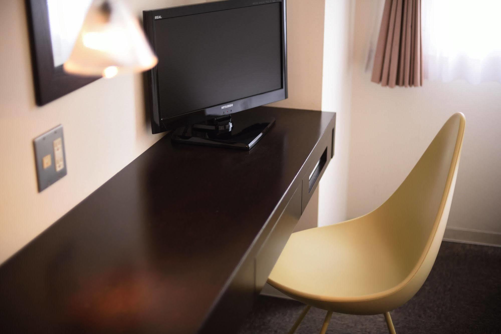 7 Days Hotel Plus Коті Екстер'єр фото